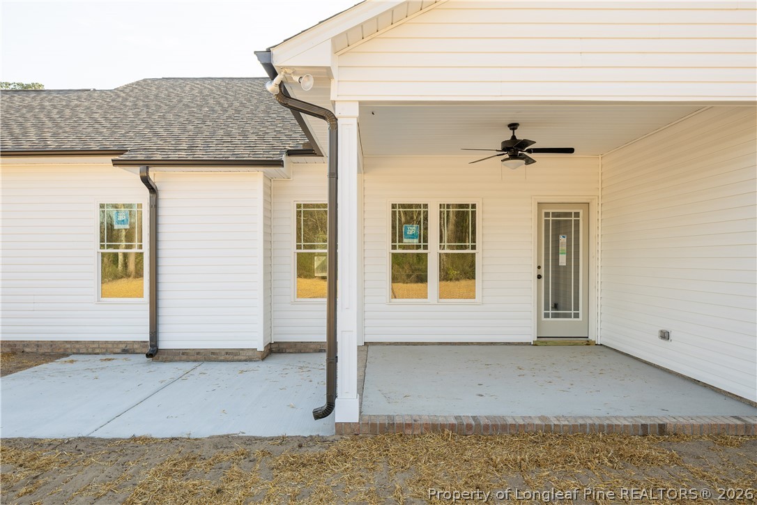1788 Alderman Mill Road Dunn, NC 28334 - Photo 14 of 14 a view of a house with a backyard
