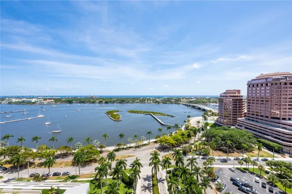 a view of a lake with a city