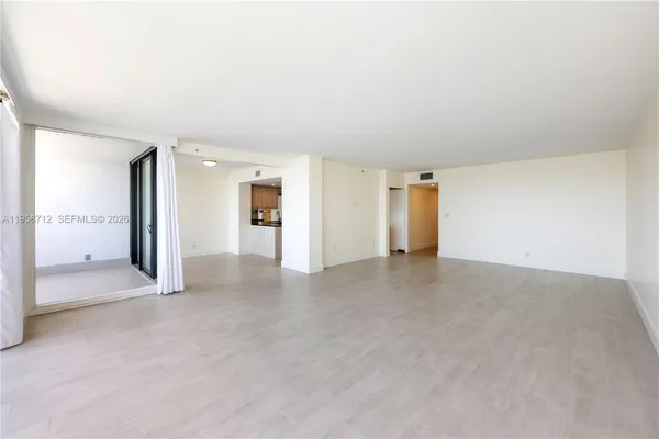 an empty room with a bathroom