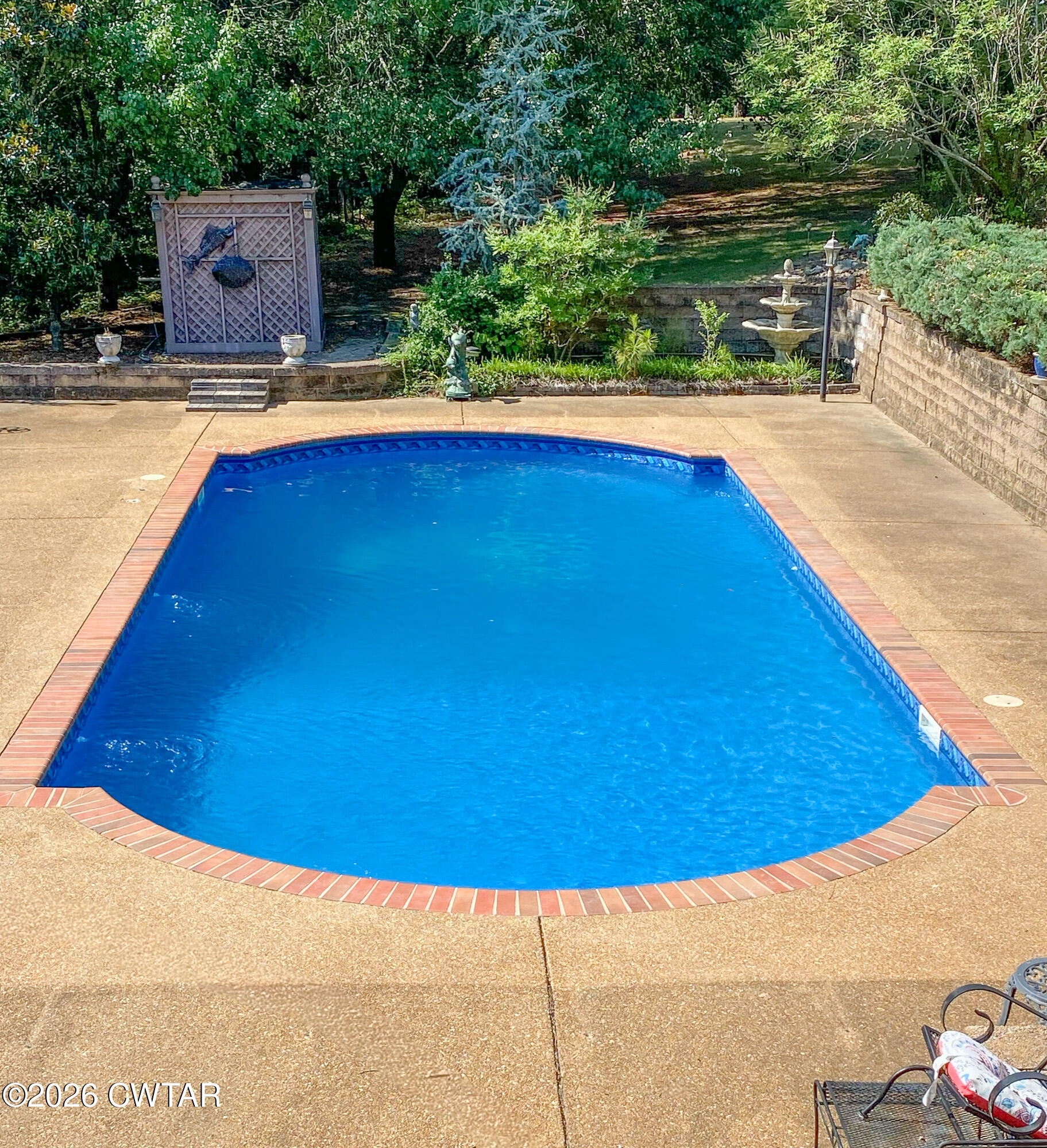 260 Myracle Town Road Parsons, TN 38363 - Photo 12 of 36 a view of a swimming pool and an outdoor space