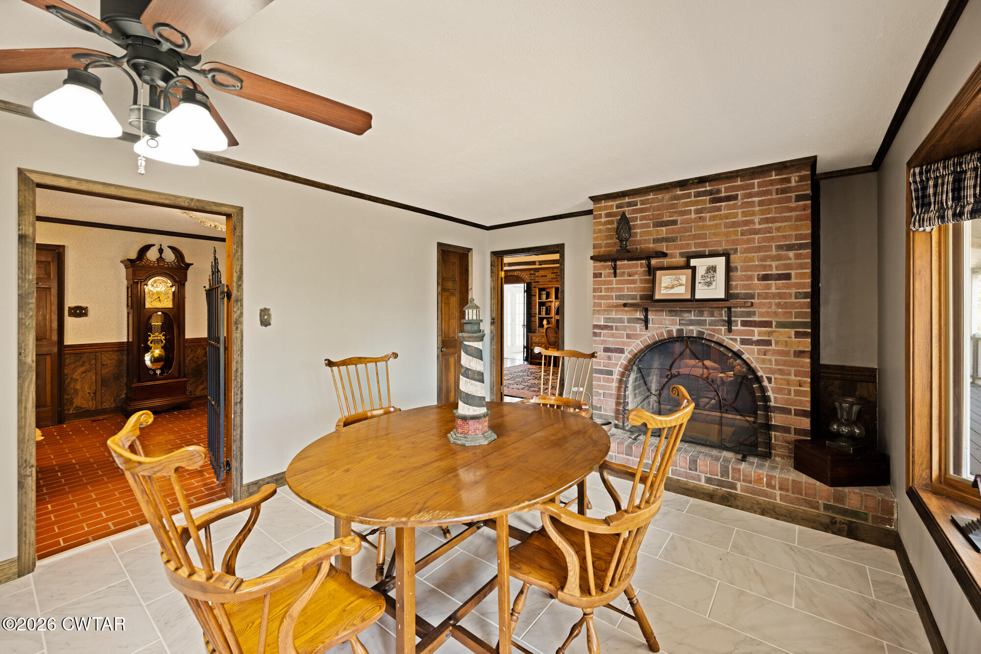 260 Myracle Town Road Parsons, TN 38363 - Photo 21 of 36 a dining room with furniture and window