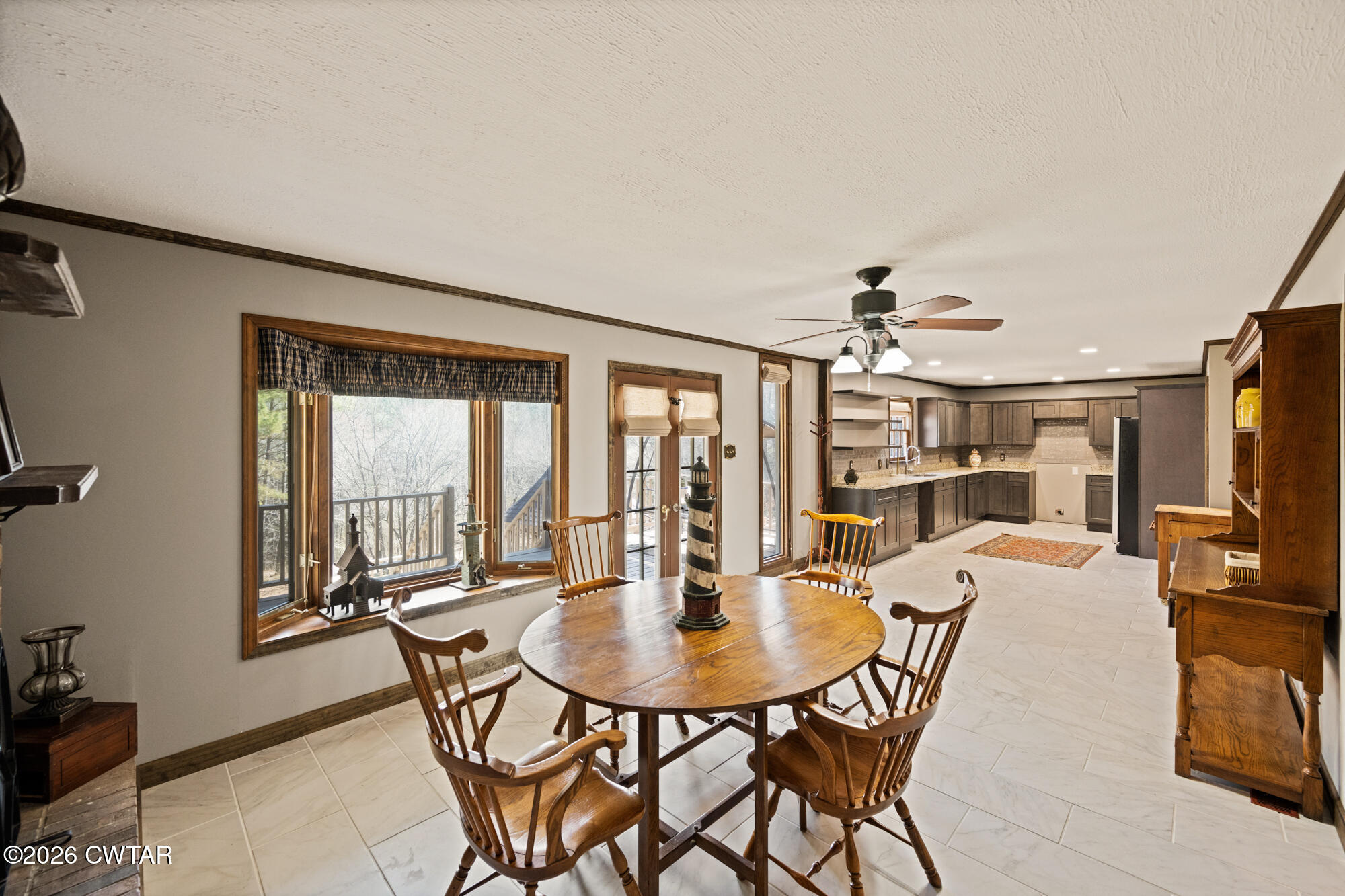 260 Myracle Town Road Parsons, TN 38363 - Photo 25 of 41 a view of a dining room with furniture and a livingroom