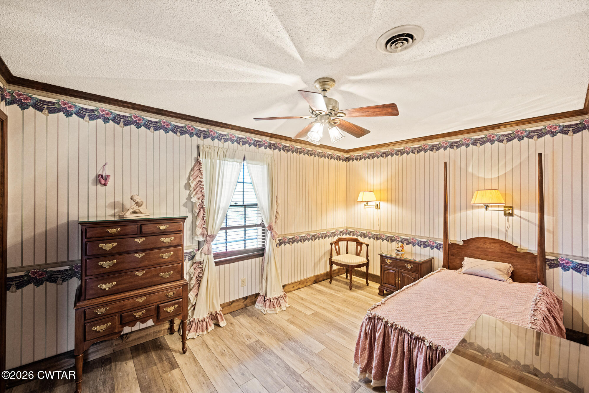 260 Myracle Town Road Parsons, TN 38363 - Photo 31 of 36 a bedroom with two beds and a large window