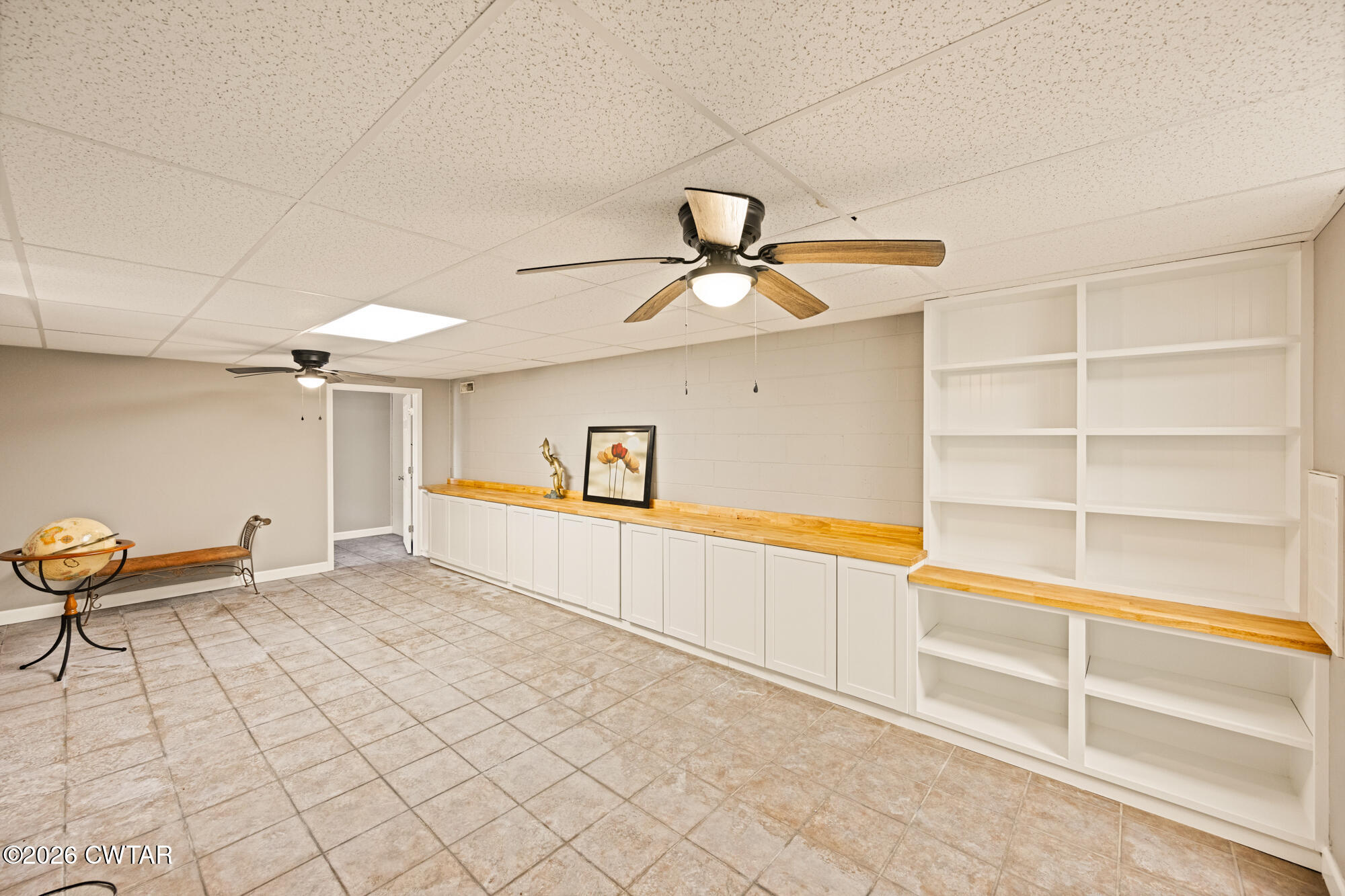 260 Myracle Town Road Parsons, TN 38363 - Photo 33 of 36 a view of a livingroom with a furniture and chandelier fan