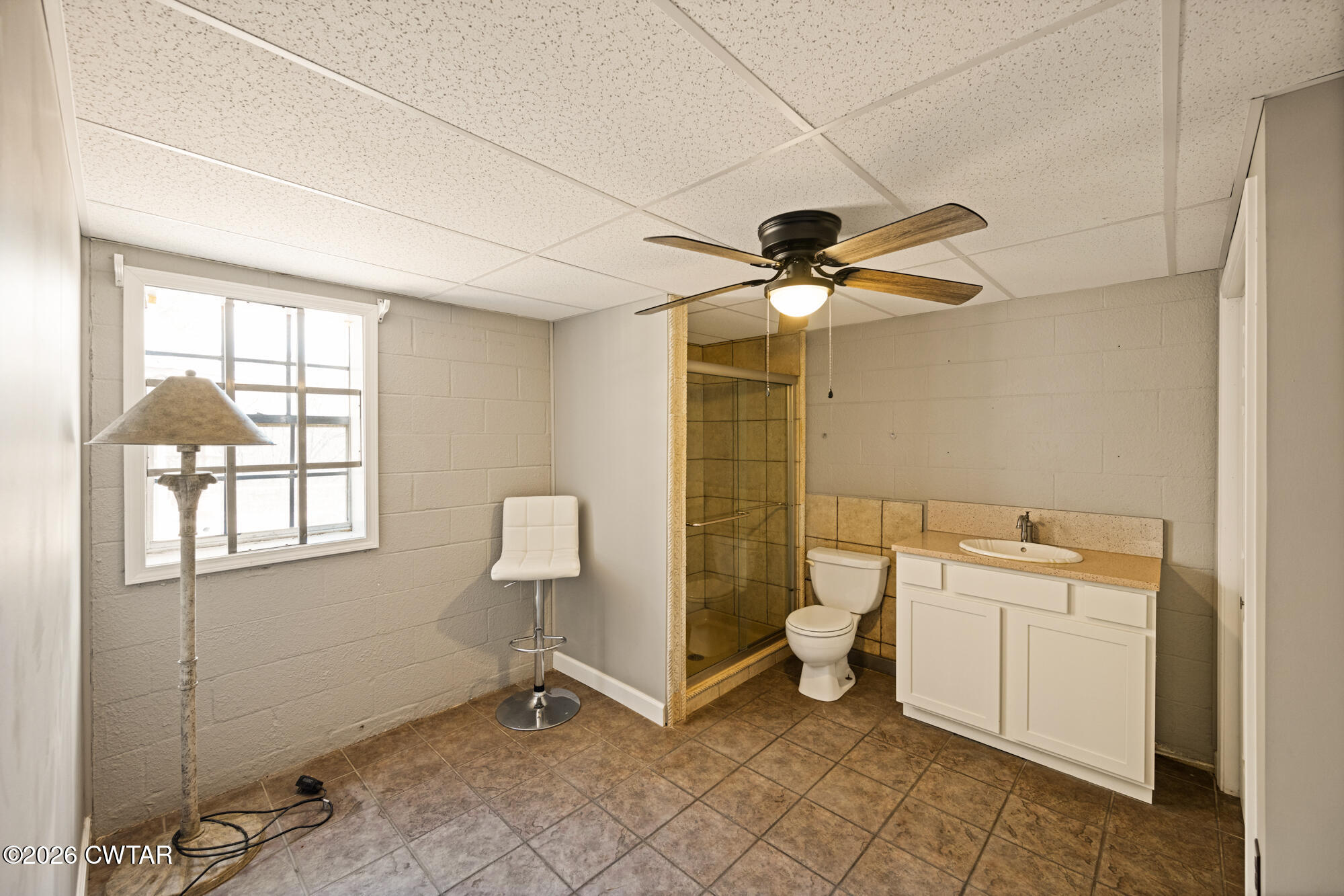 260 Myracle Town Road Parsons, TN 38363 - Photo 34 of 36 a bathroom with a toilet sink and mirror