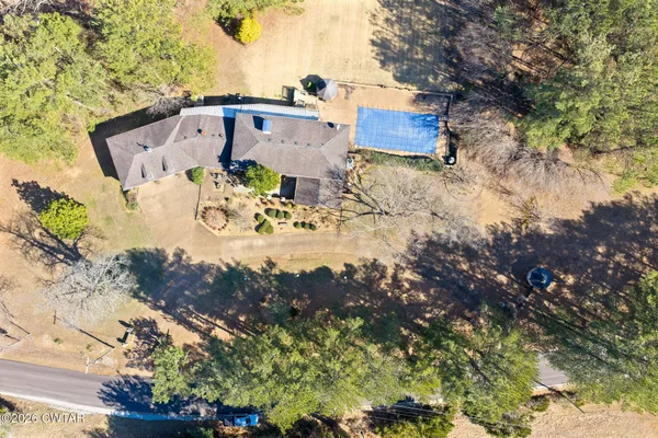 a view of a house with snow on the ground