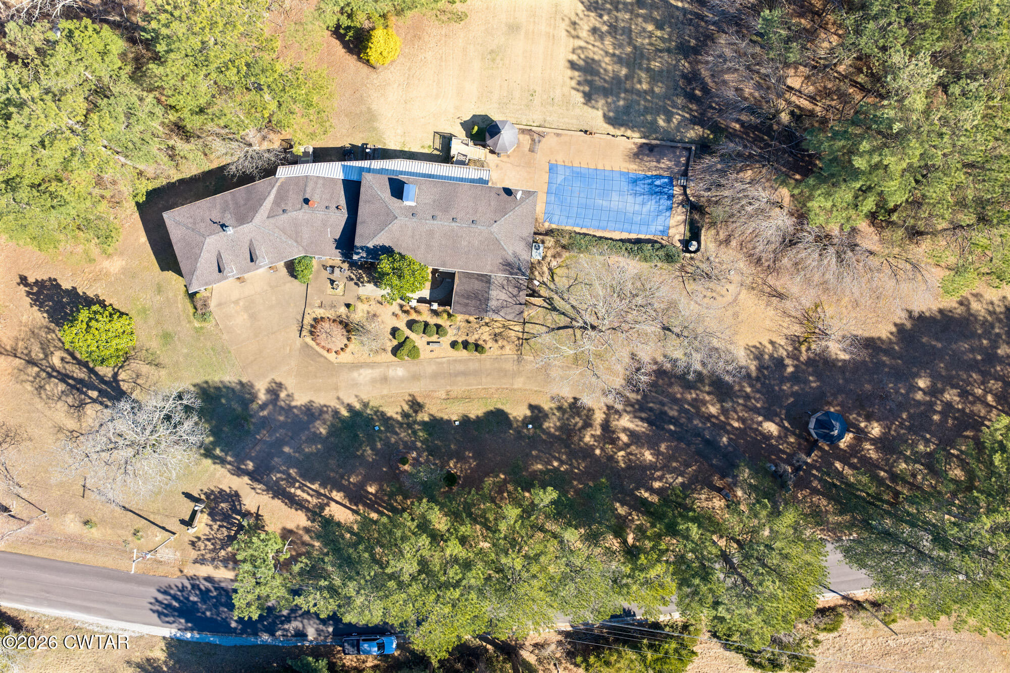 260 Myracle Town Road Parsons, TN 38363 - Photo 6 of 36 a view of a house with a yard and sitting area