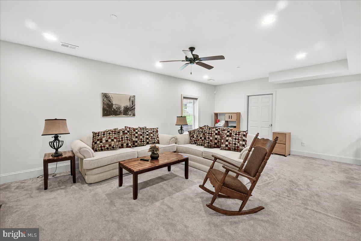 2516 Daisy Road Woodbine, MD 21797 - Photo 35 of 78 Spacious living area with cozy charm.