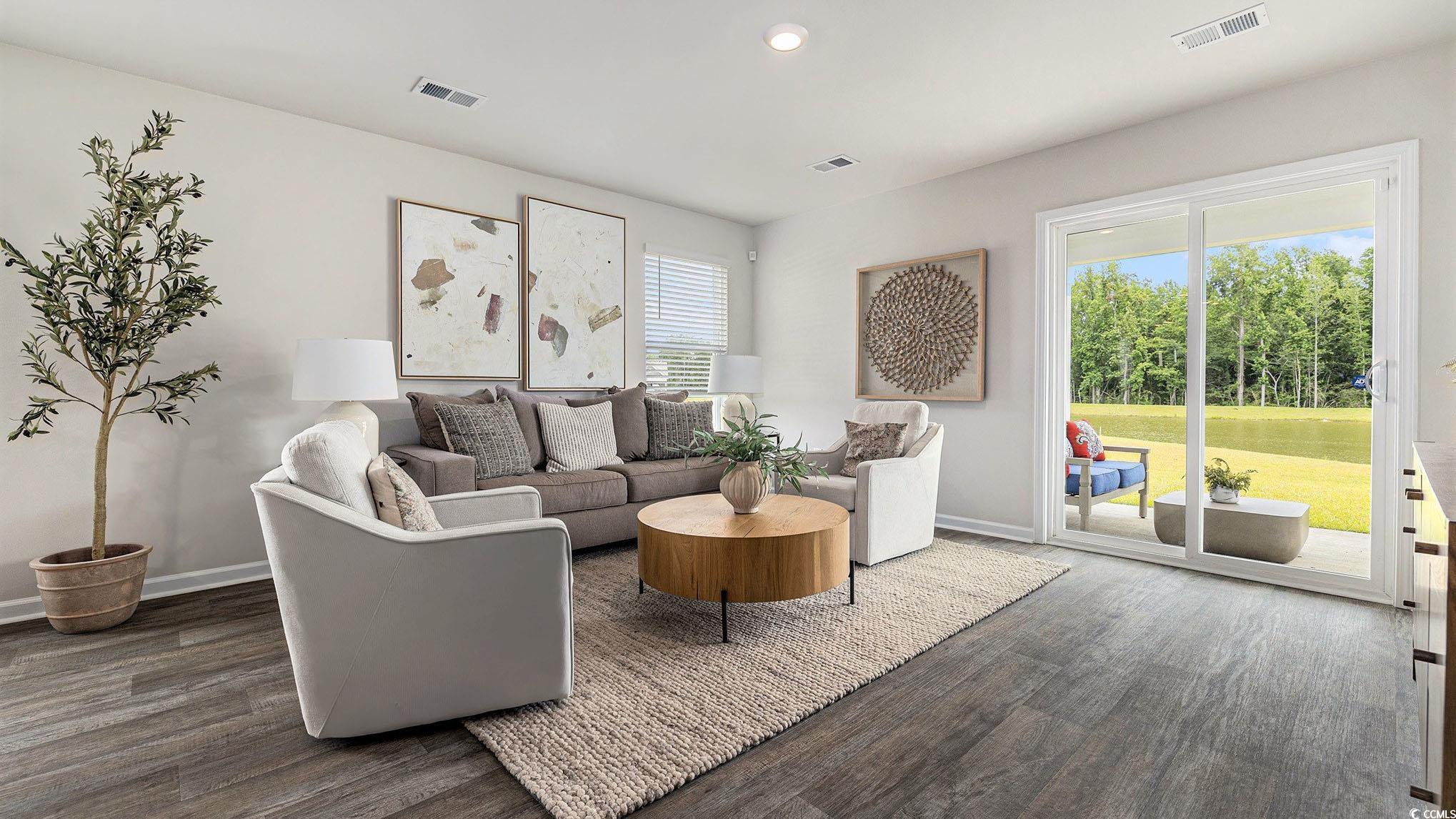117 Homestead Way Myrtle Beach, SC 29588 - Photo 10 of 23 Living area with wood finished floors and recessed lighting