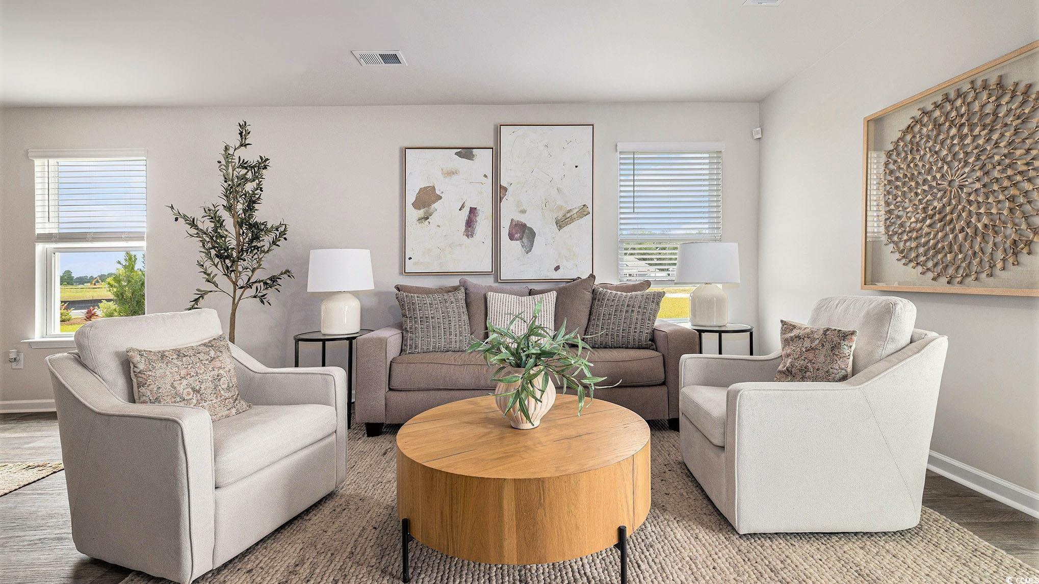 117 Homestead Way Myrtle Beach, SC 29588 - Photo 11 of 23 Living room featuring baseboards and wood finished floors