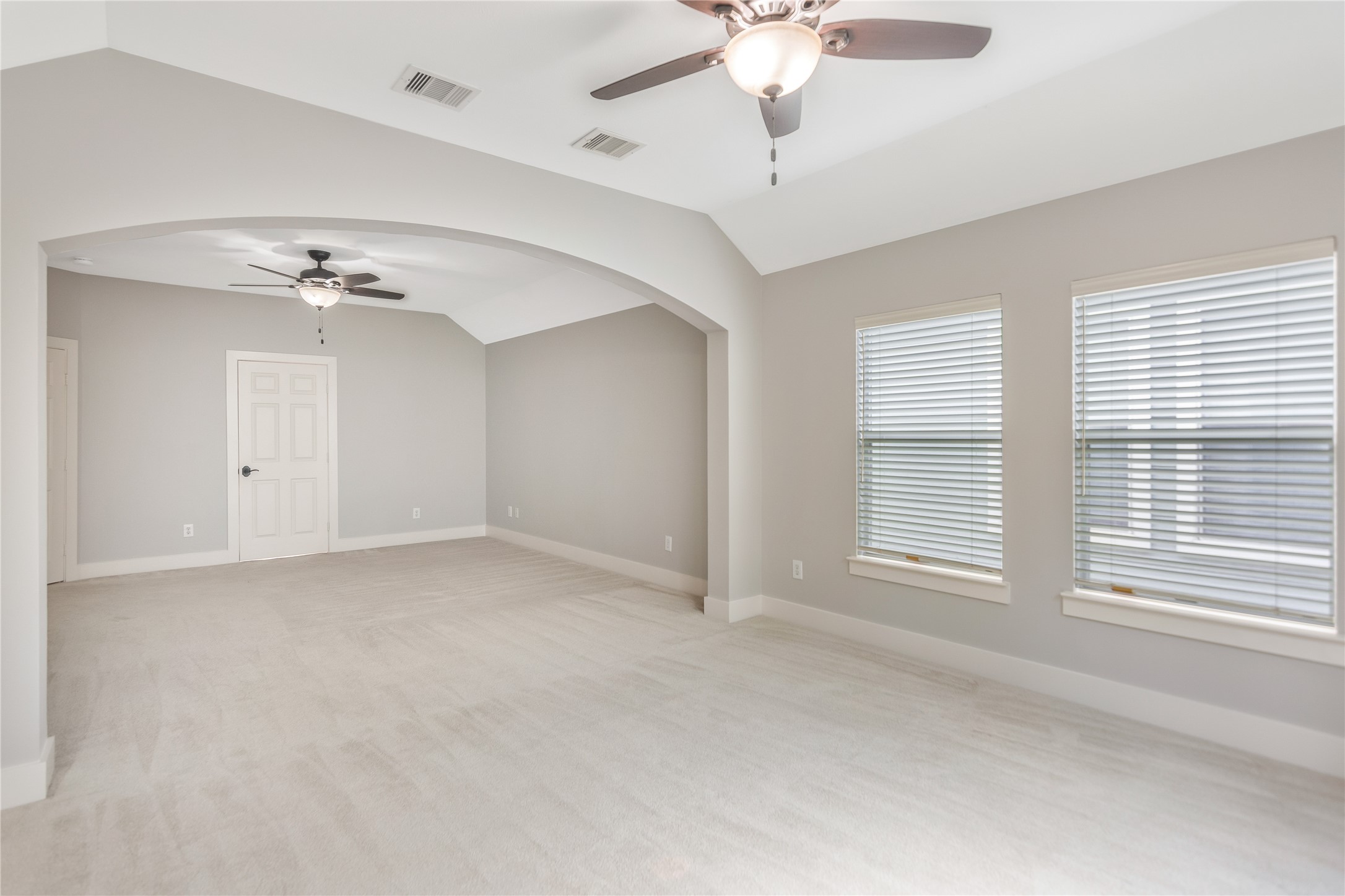 1207 Nagle Street Houston, TX 77003 - Photo 20 of 26 The Primary Bedroom areas are divided by an arched wall giving it a little character.