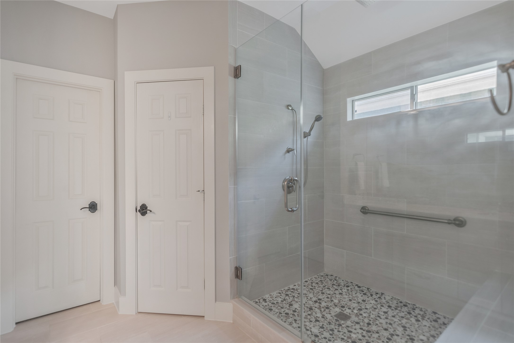 1207 Nagle Street Houston, TX 77003 - Photo 24 of 26 Primary Bathroom features an upgraded oversized shower with regular shower head and a rain shower head