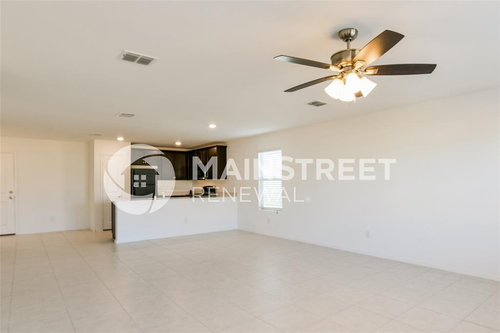 340 Dry Cyn Way Haslet, TX 76052 - Photo 9 of 15 a view of a livingroom and a kitchen