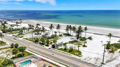 a view of outdoor space with palm trees