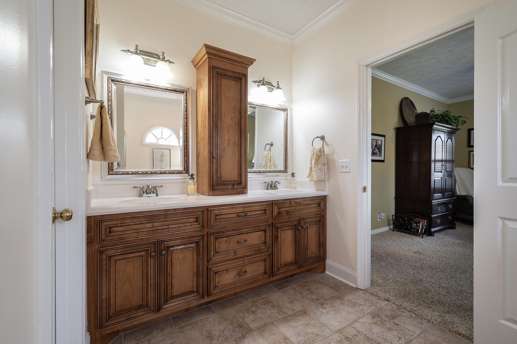 2407 Taylor Close Murfreesboro, TN 37130 - Photo 13 of 42 a spacious en suite bathroom with a double vanity sink and a mirror