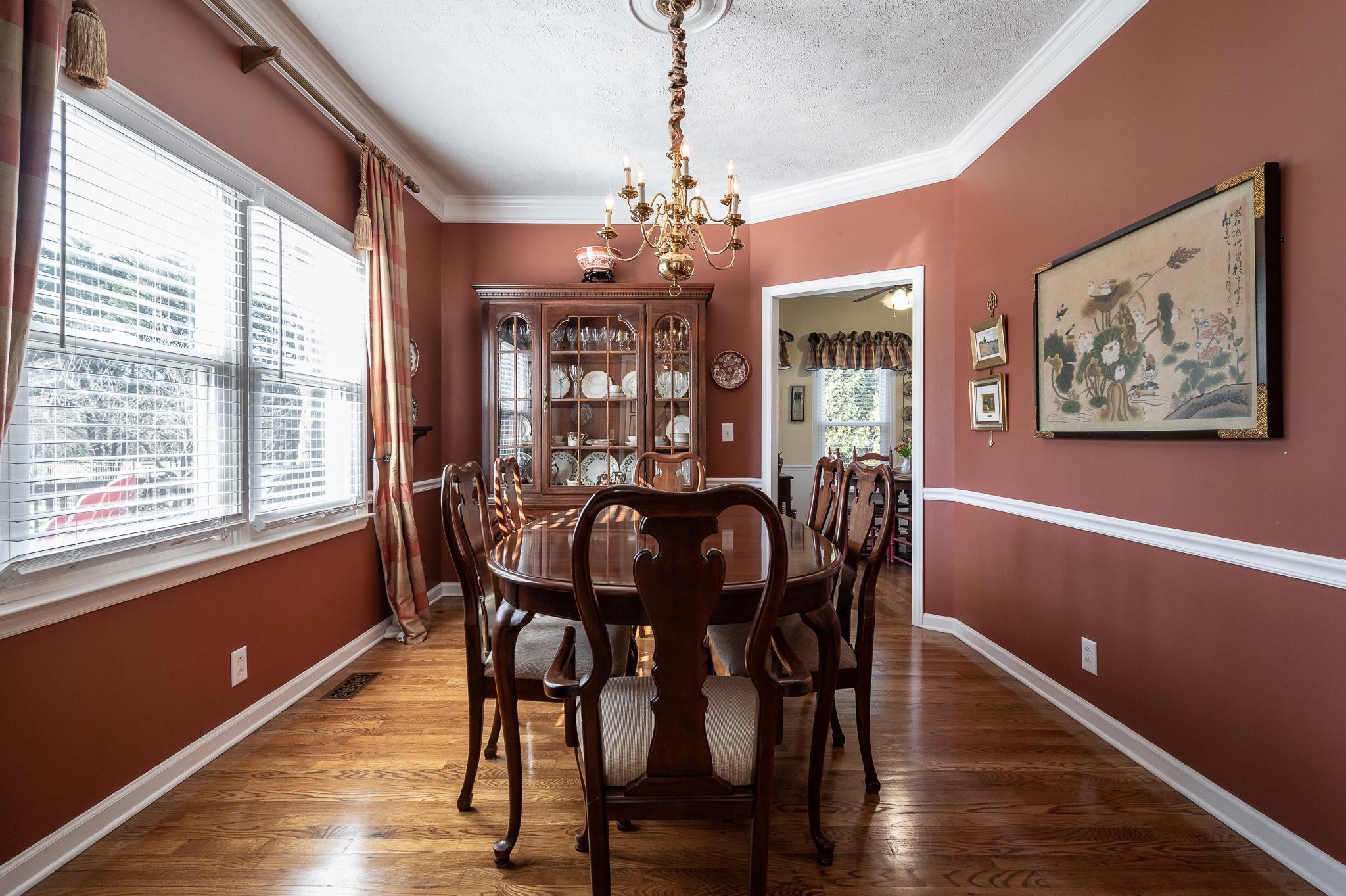 2407 Taylor Close Murfreesboro, TN 37130 - Photo 14 of 42 a view of a dining room with furniture window and wooden floor