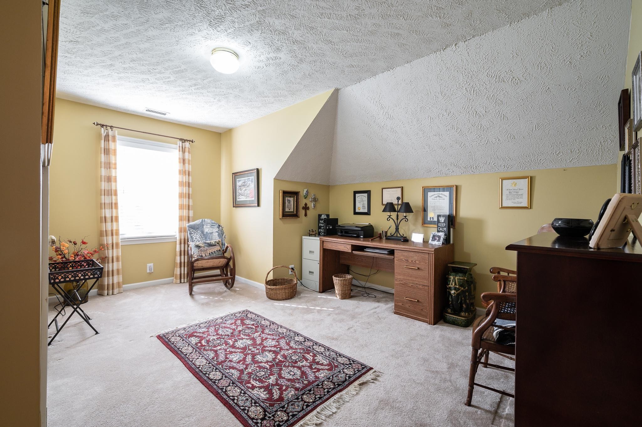2407 Taylor Close Murfreesboro, TN 37130 - Photo 25 of 42 a living room with furniture rug and window