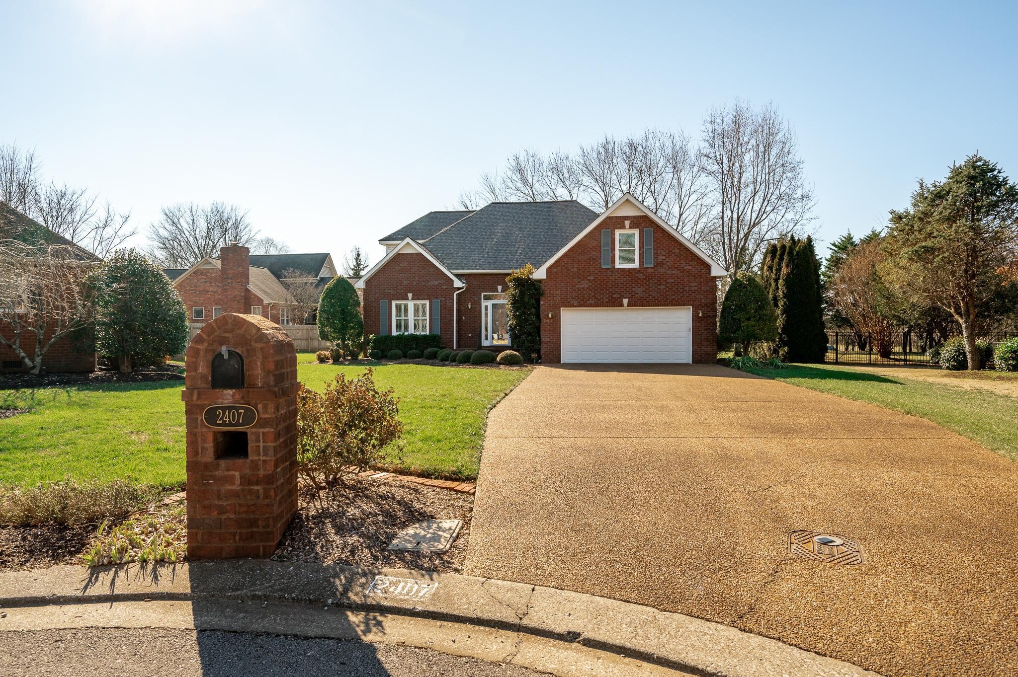 2407 Taylor Close Murfreesboro, TN 37130 - Photo 3 of 42 a front view of a house with a yard