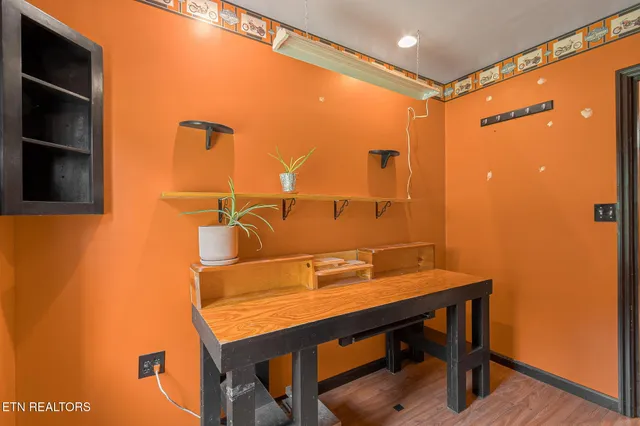 a bathroom with a sink a mirror and shower