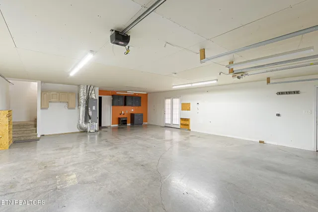 a view of a kitchen with wooden floor