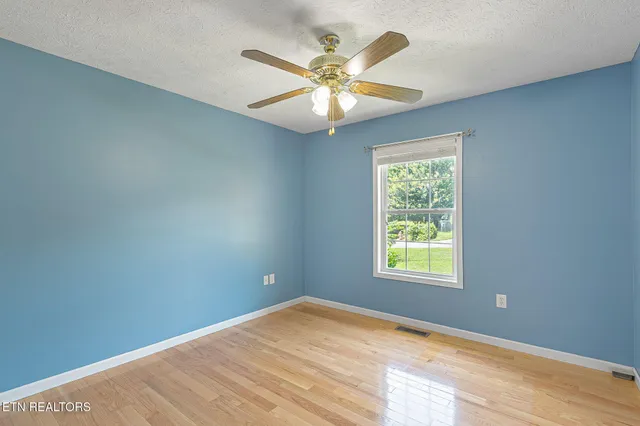 a view of a big yard with green space