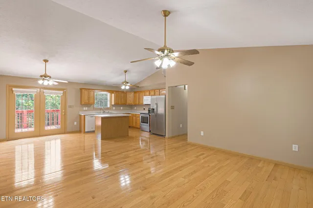 a view of a kitchen with furniture and a chandelier