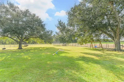 a view of yard with trees