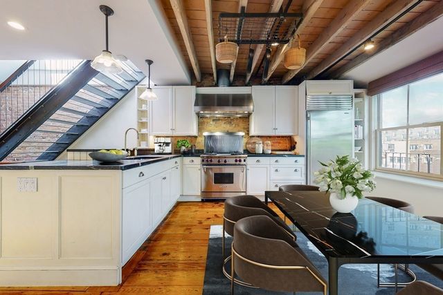 a kitchen with granite countertop lots of counter top space