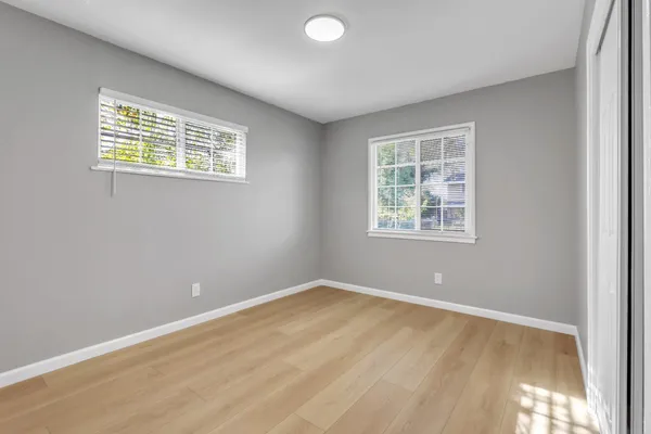 an empty room with windows