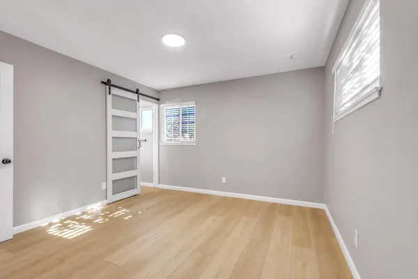 an empty room with windows