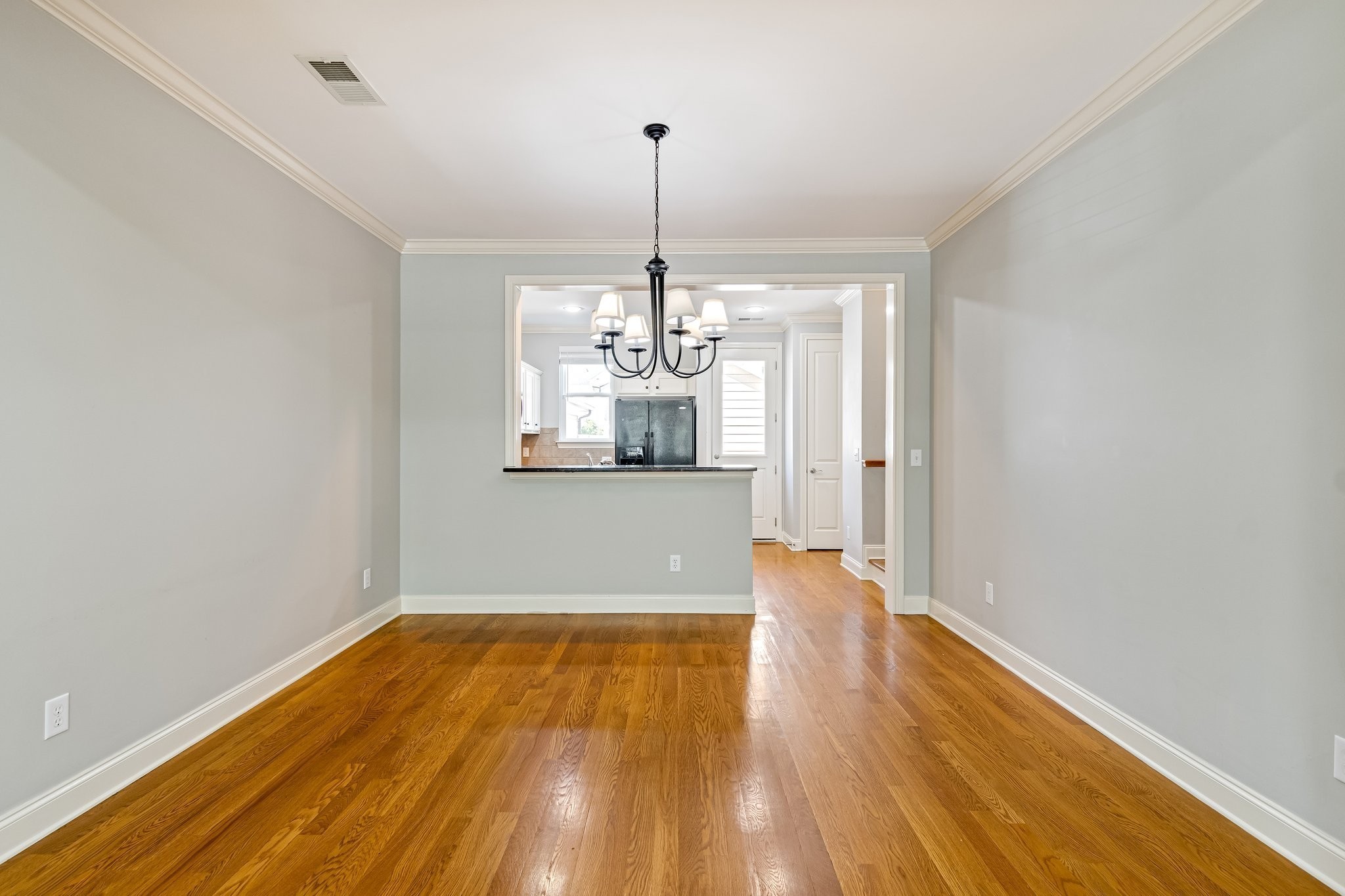 318 Byron Way Franklin, TN 37064 - Photo 12 of 53 a view of a room with wooden floor chandelier and entryway
