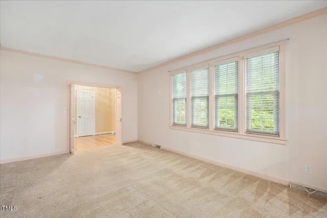 an empty room with windows