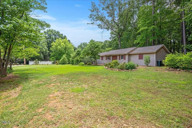 a house view with a garden space