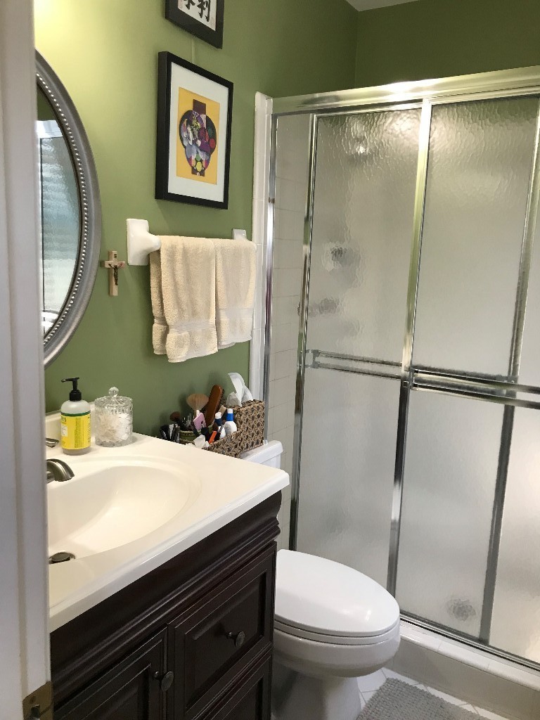 1210 General George Patton Road Nashville, TN 37221 - Photo 8 of 22 a bathroom with a sink mirror vanity and toilet