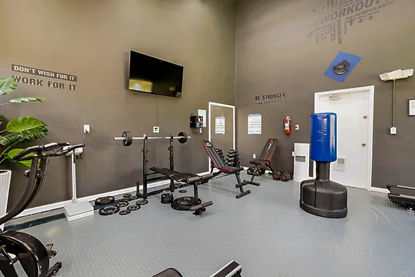 a view of a room with gym equipment