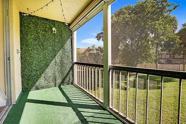 a view of a balcony with staircase