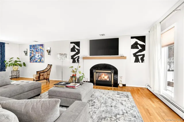 a kitchen with granite countertop white cabinets and appliances