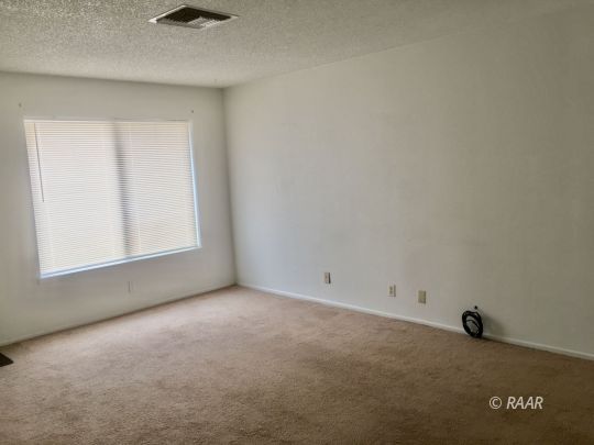 220 South Valley Street Ridgecrest, CA 93555 - Photo 17 of 17 an empty room with a window