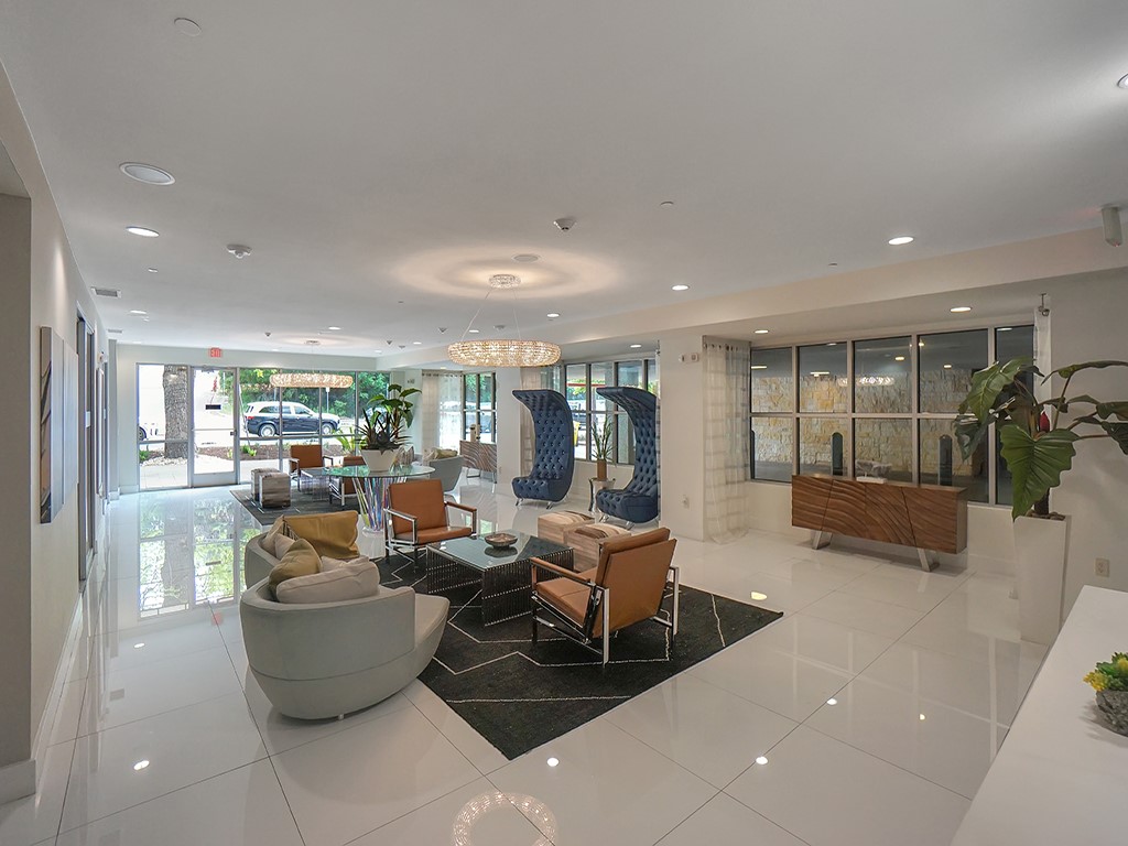 1900 Barton Springs Road, Unit 4013A Austin, TX 78704 - Photo 22 of 31 a living room with furniture and a large window