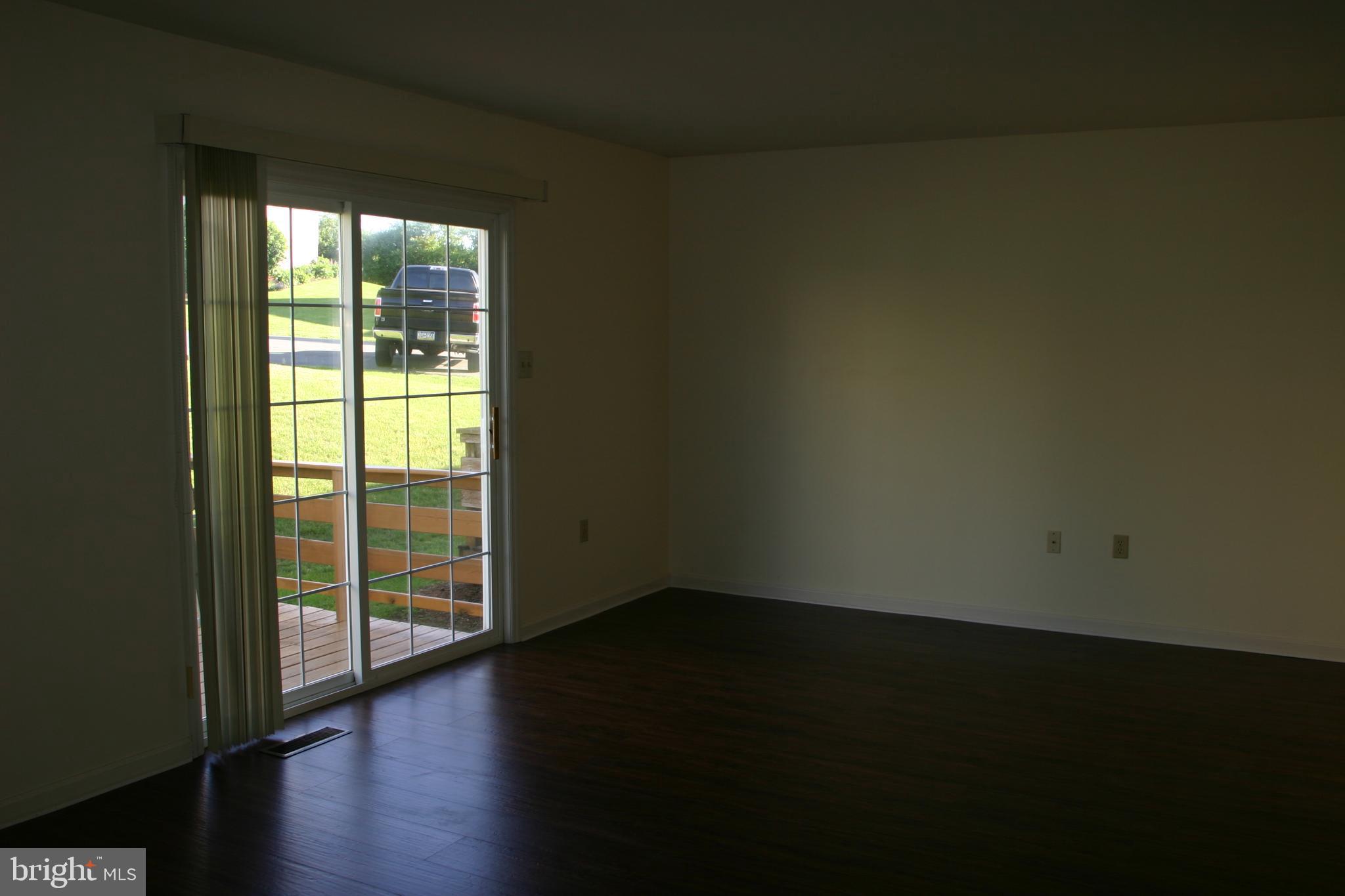 19-3 Cranberry Ridge, Unit 193 Reading, PA 19606 - Photo 9 of 22 Bright and airy space with outdoor access.