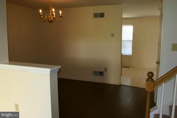 a view of a chandelier in a room