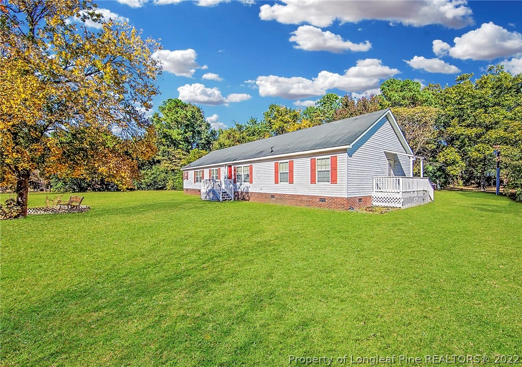 5384 Wade-Stedman Road Wade, NC 28395 - Photo 2 of 18 a view of a house with a big yard
