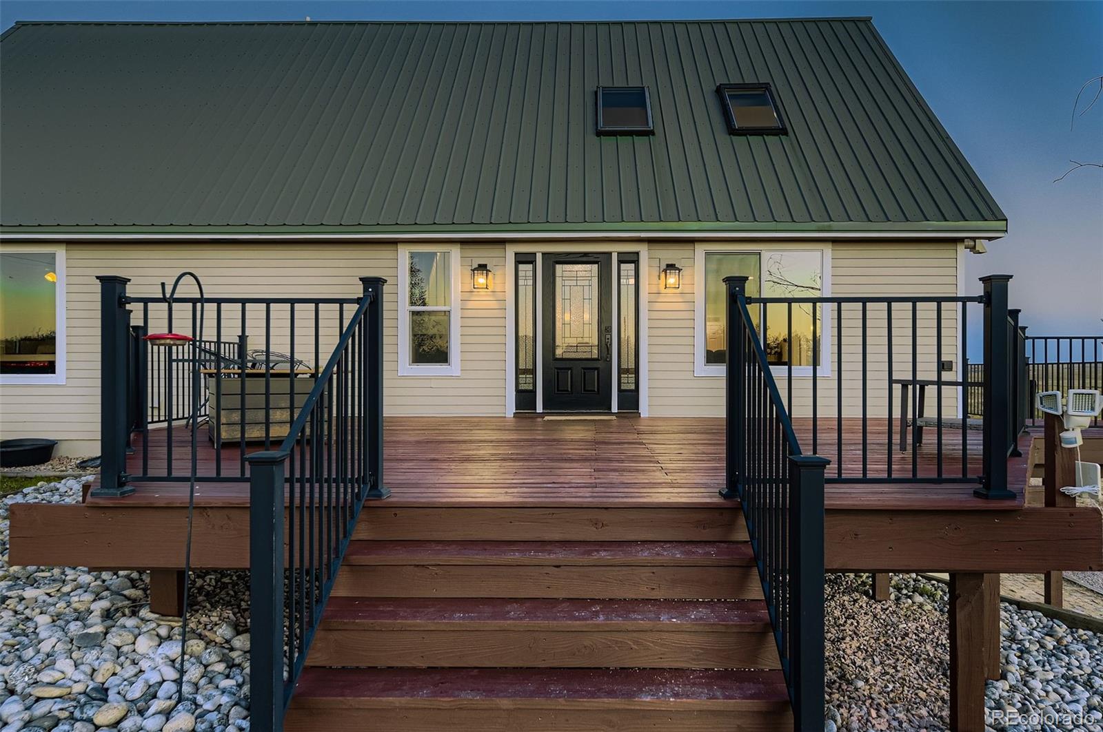 28242 Stone Horse Ranch Road Elbert, CO 80106 - Photo 26 of 39 a view of staircase with black and white walls