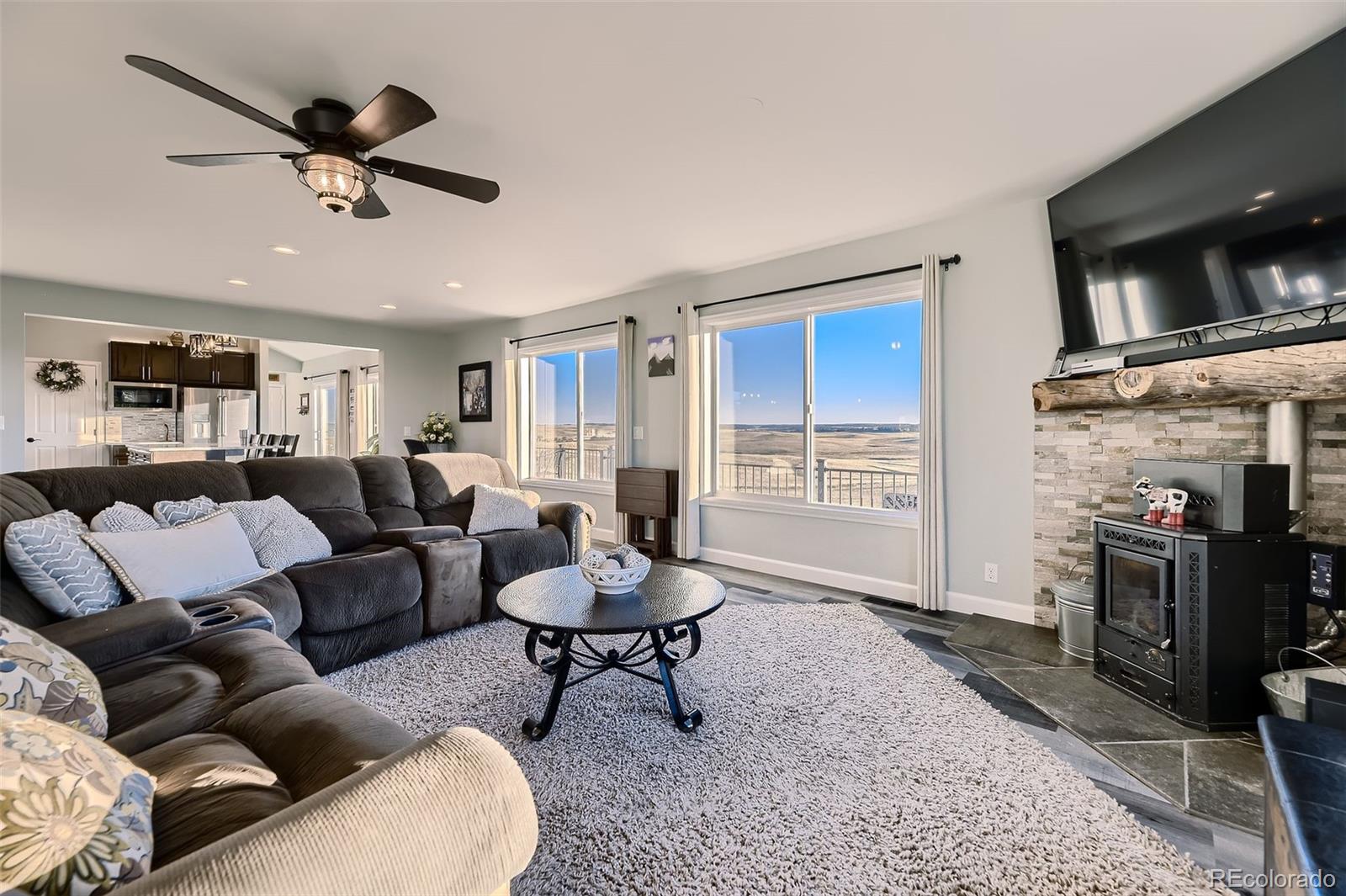 28242 Stone Horse Ranch Road Elbert, CO 80106 - Photo 5 of 39 a living room with furniture