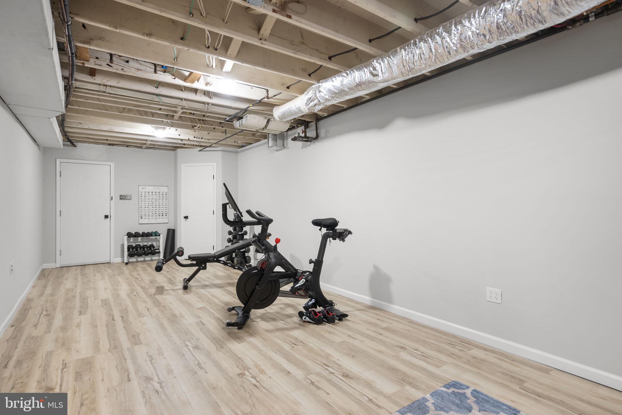 12806 Gaffney Road Silver Spring, MD 20904 - Photo 44 of 57 a view of a room with gym equipment