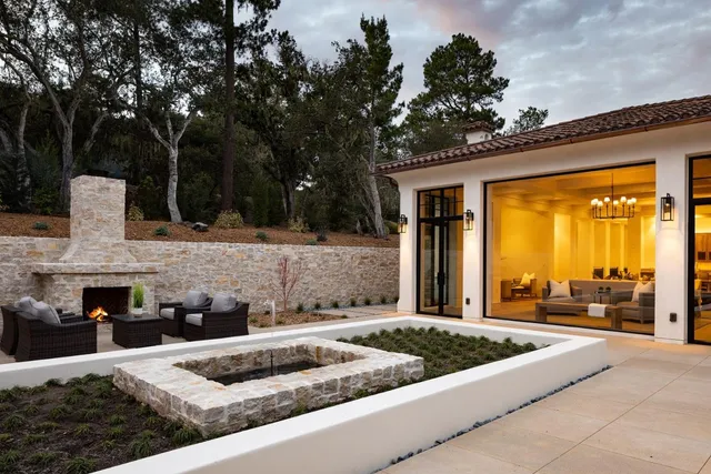 a front view of a house with porch and dining area