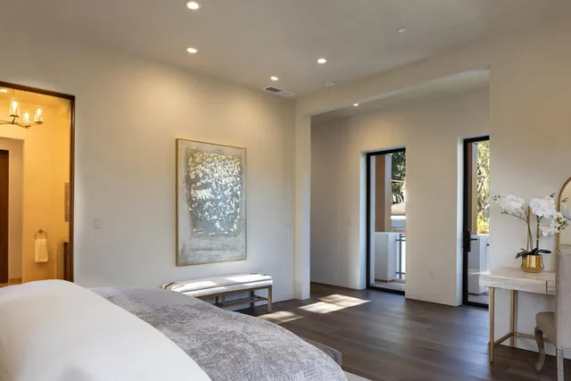a bathroom with a double vanity sink and mirror