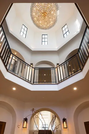 a view of staircase with a rug