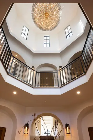 a view of staircase with a rug