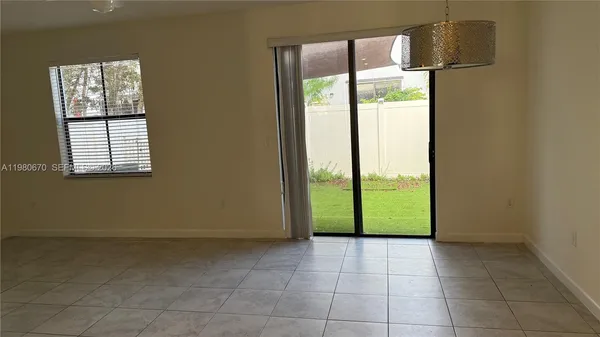 a view of a room that has a window in it